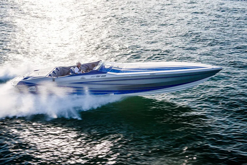 Slide: The Image of 2025 Cigarette 38 Top Gun speedboat cruising on open water. - 5