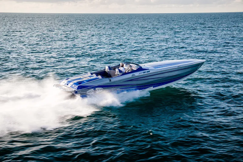 Slide: The Image of 2025 Cigarette 38 Top Gun speedboat cruising on open water. - 6