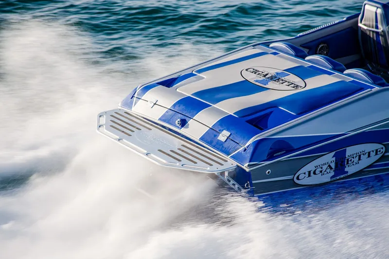 Slide: The Image of 2025 Cigarette 38 Top Gun speedboat on water, rear view. - 7