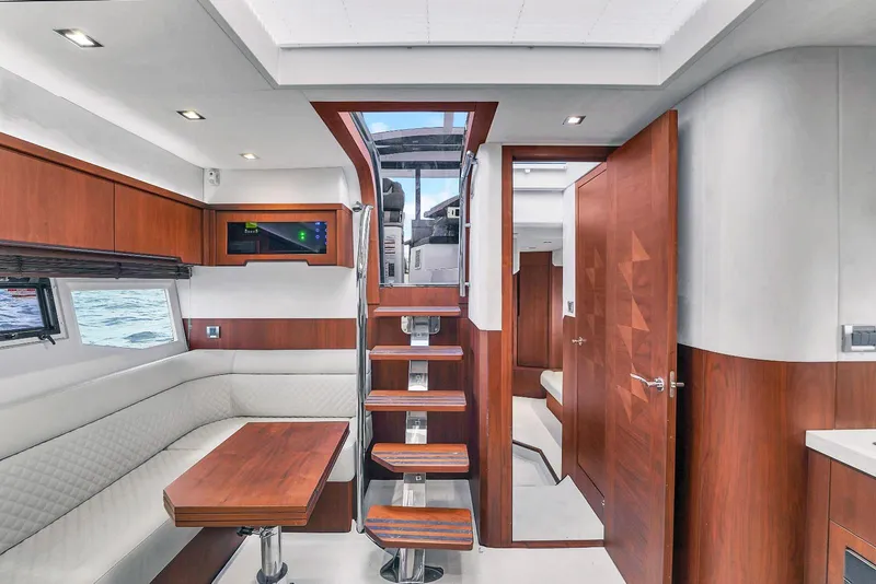Slide: The Image of Interior of 2017 Galeon 445 HTS yacht with wooden finishes and modern design. - 18
