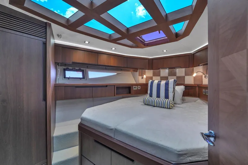 Slide: The Image of Luxurious bedroom interior of 2017 Galeon 445 HTS yacht with skylight and modern design. - 28