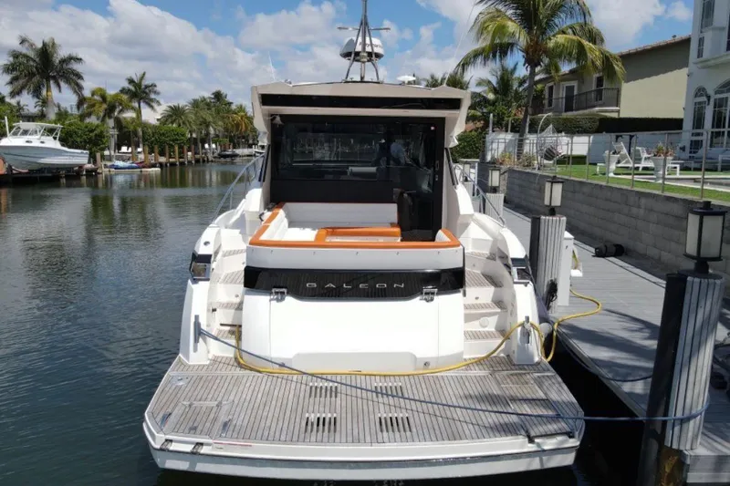 Slide: The Image of 2017 Galeon 445 HTS yacht docked in a sunny marina. - 3