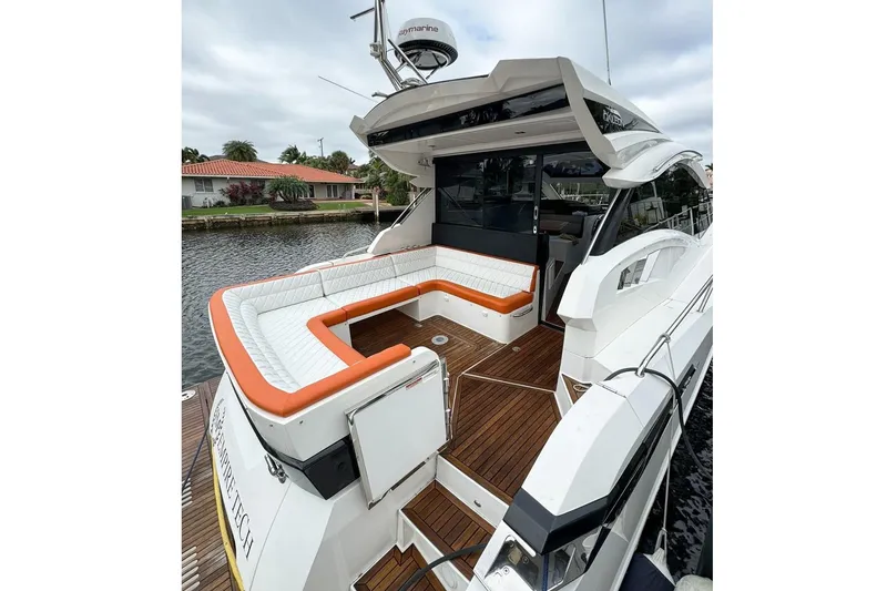 Slide: The Image of 2017 Galeon 445 HTS yacht with spacious deck and comfortable seating. - 4