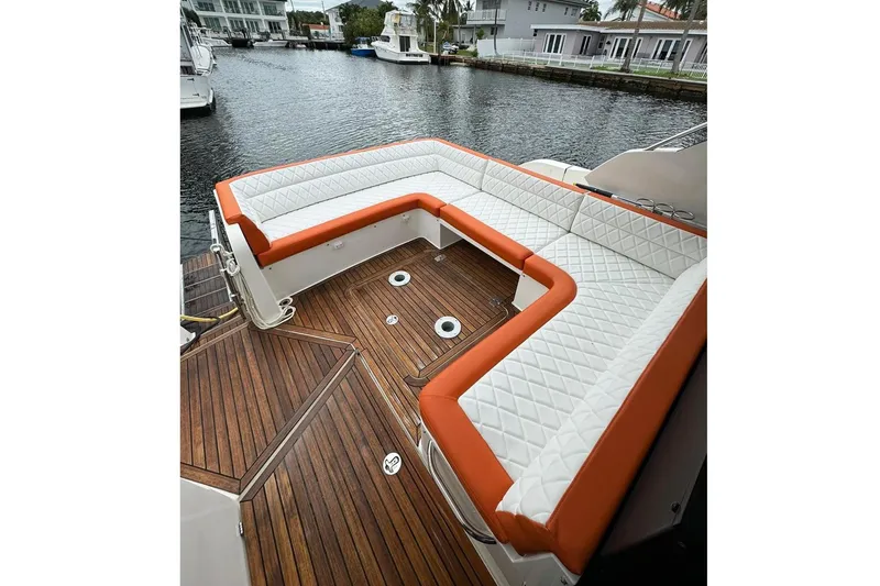 Slide: The Image of 2017 Galeon 445 HTS yacht with luxurious deck seating. - 5