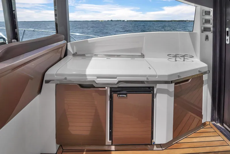 Slide: The Image of Outdoor kitchenette on 2017 Galeon 445 HTS yacht with ocean view. - 9