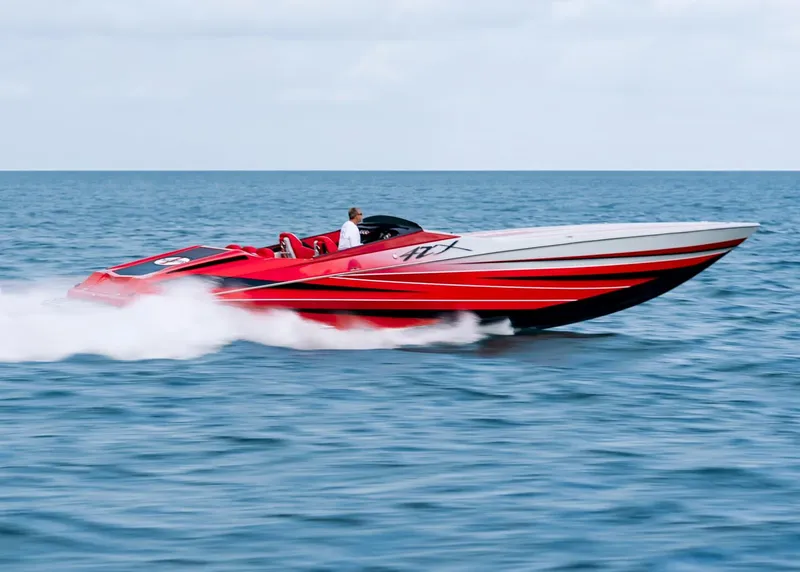 Slide: The Image of Red 2025 Cigarette 42X speedboat racing on the ocean. - 10