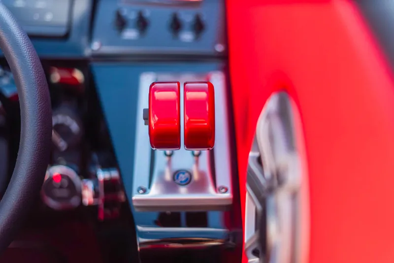 Slide: The Image of Throttle controls of a 2025 Cigarette 42X powerboat. - 13