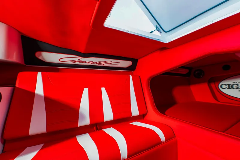 Slide: The Image of Interior of 2025 Cigarette 42X boat with red and white seating. - 18
