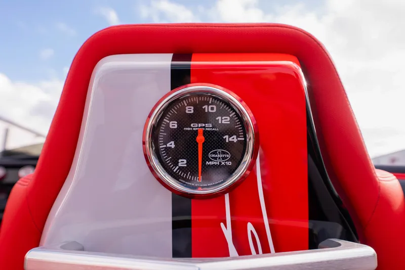 Slide: The Image of Speedometer of 2025 Cigarette 42X boat with red and black design. - 24