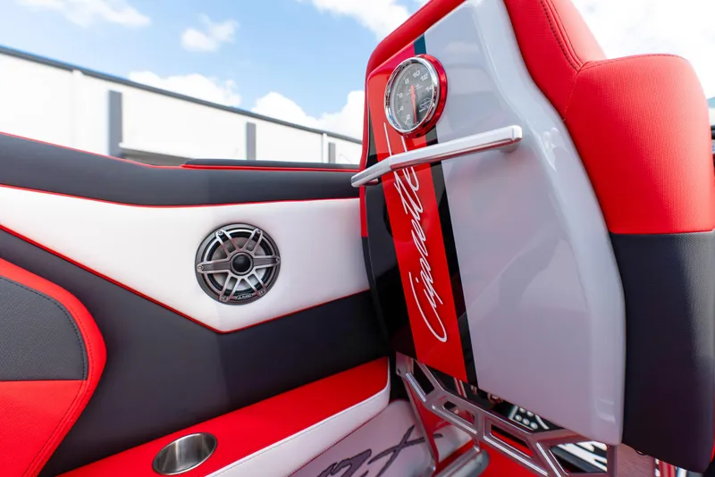 Slide: The Image of 2025 Cigarette 42X boat interior with red and white upholstery and branded detailing. - 26