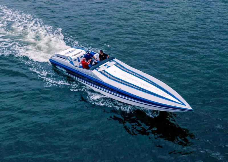 Slide: The Image of 2025 Cigarette 42X speedboat cruising on open water. - 3