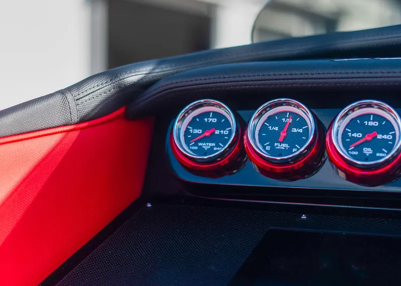 Slide: The Image of Dashboard gauges of 2025 Cigarette 42X boat, close-up view. - 39