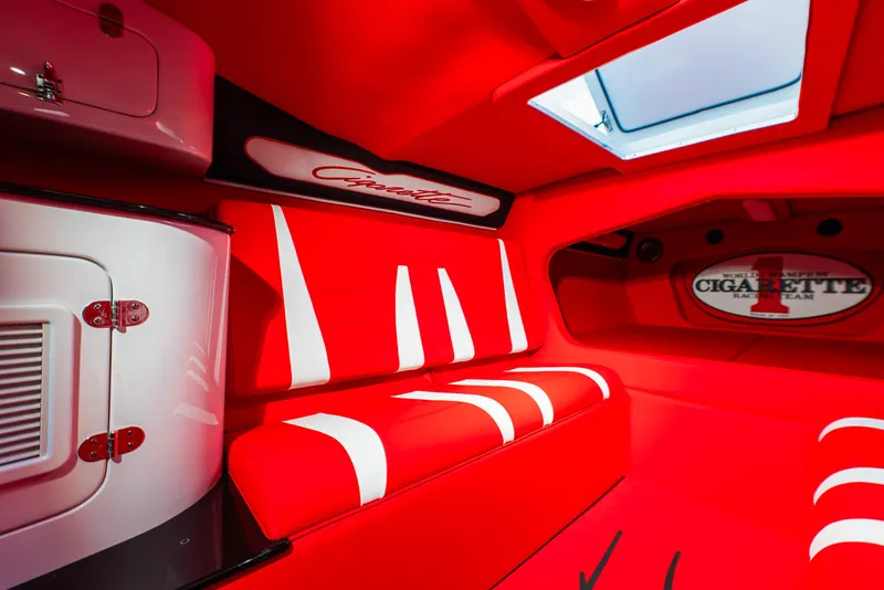 Slide: The Image of Interior of 2025 Cigarette 42X boat with red and white seating. - 41