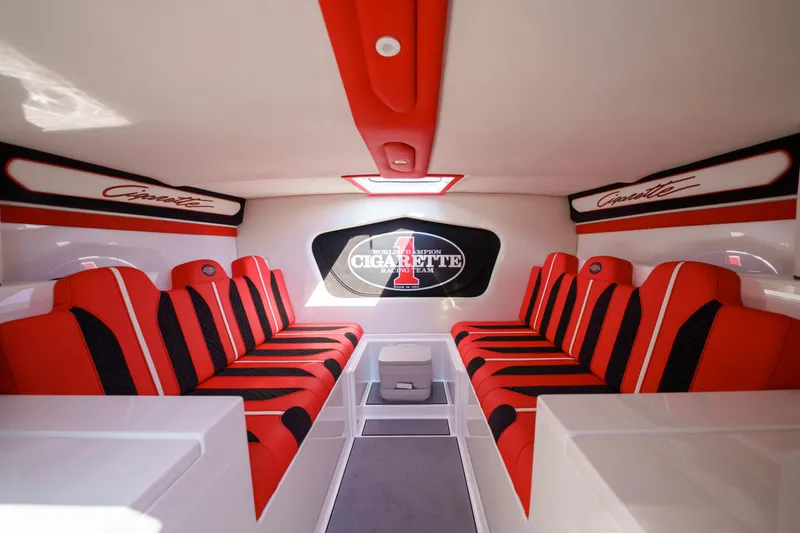 Slide: The Image of Interior of 2025 Cigarette 515 boat with red and black seating. - 11