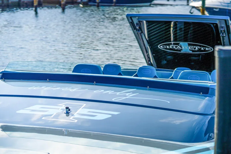 Slide: The Image of 2025 Cigarette 515 boat docked by the water. - 19