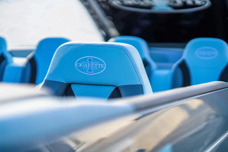 Slide: The Image of 2025 Cigarette 515 boat with blue leather seats. - 20