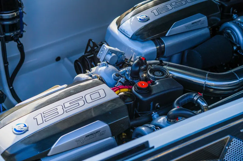 Slide: The Image of Cigarette 515 2025 model engine compartment with dual 1350 horsepower engines. - 22