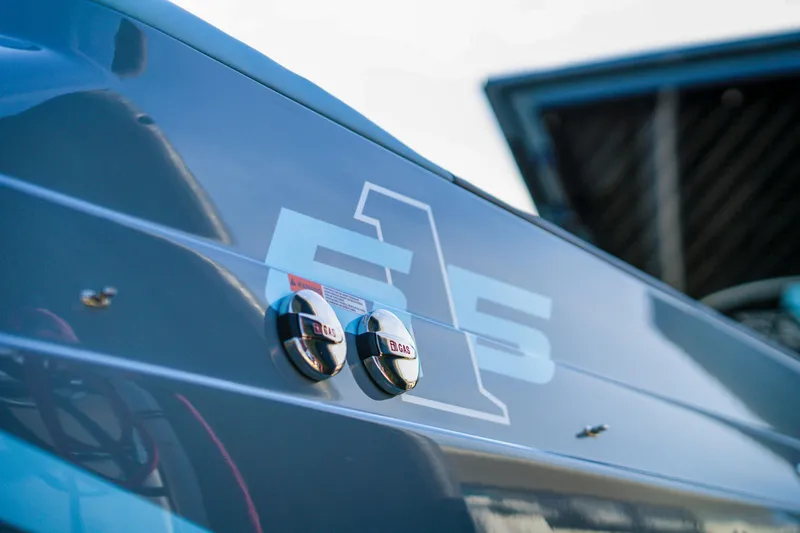 Slide: The Image of Close-up of 2025 Cigarette 515 boat exterior with model number. - 27