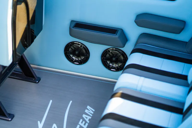 Slide: The Image of Interior of 2025 Cigarette 515 boat with speakers and seating. - 28