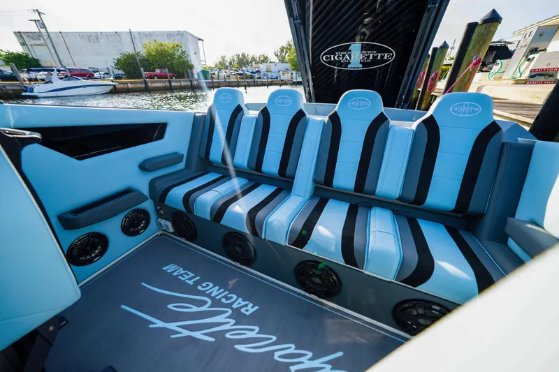 Slide: The Image of Interior of 2025 Cigarette 515 boat with blue and black seating. - 32