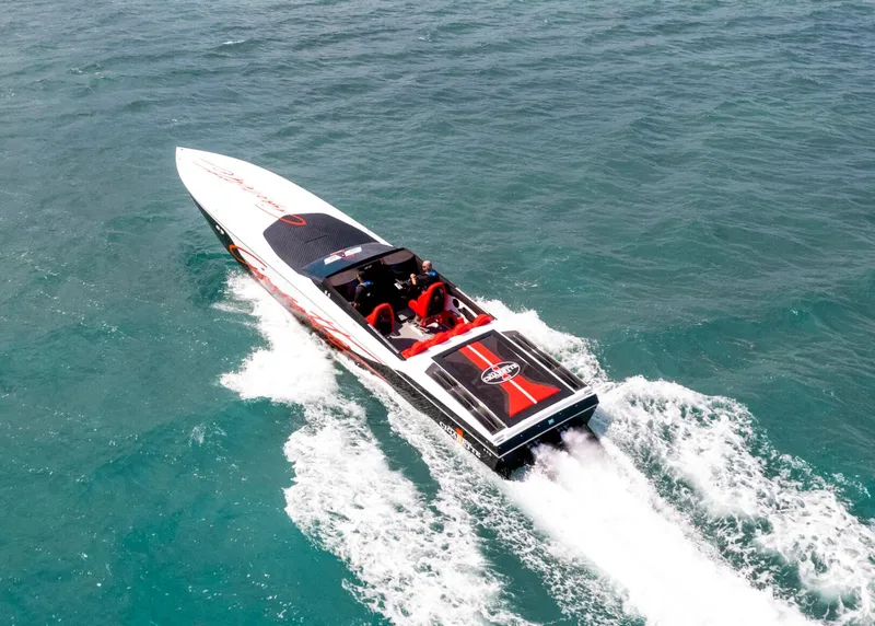 Slide: The Image of 2025 Cigarette 515 speedboat cruising on open water. - 4