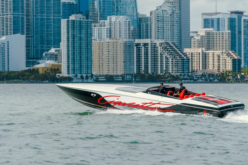Slide: The Image of 2025 Cigarette 515 speedboat cruising near city skyline. - 7