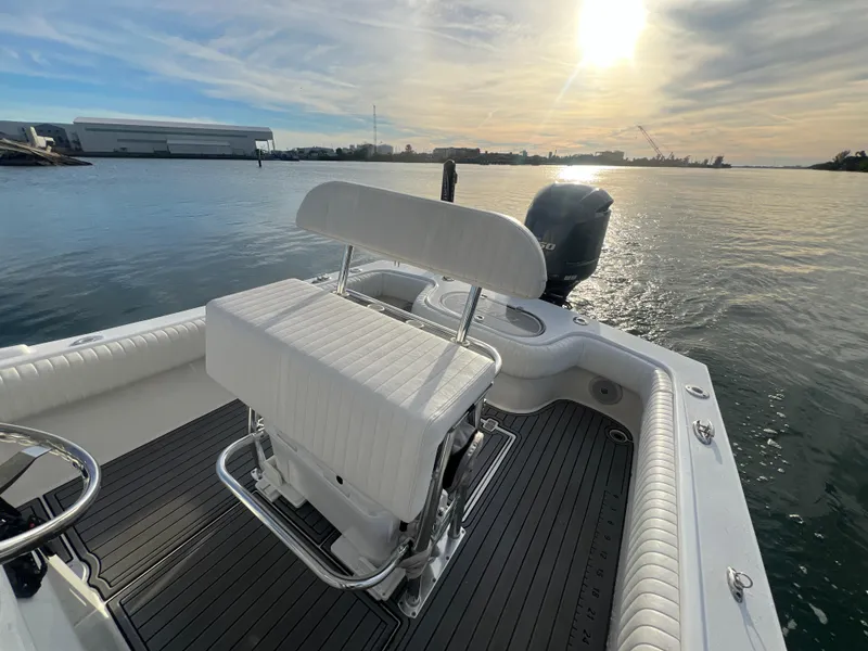 Slide: The Image of 2024 Deno 2400 CC boat on water at sunset. - 8