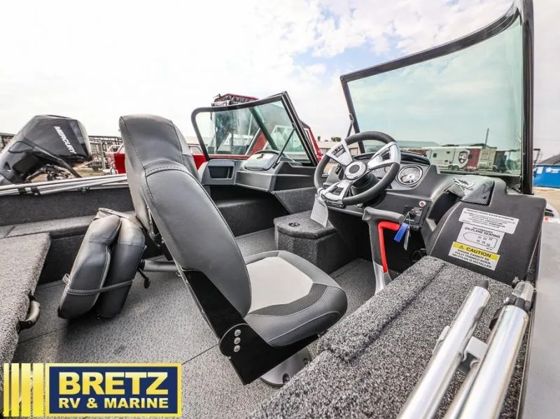 Slide: The Image of 2024 Fishing Machine 1775 WT boat interior with steering wheel and seating at Bretz RV & Marine. - 9