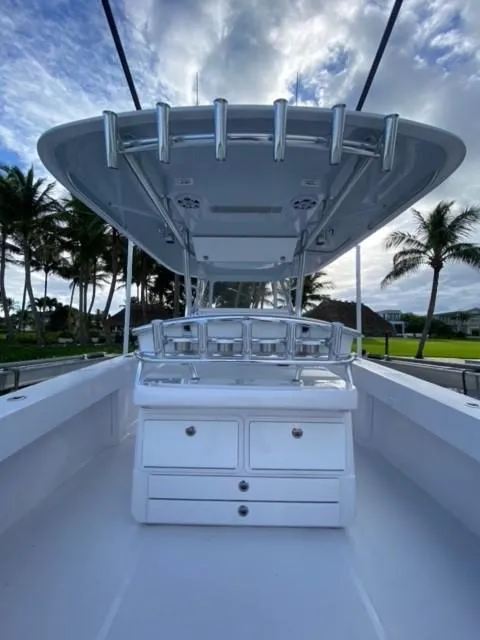 Slide: The Image of 2024 Bahama 35' Open Fisherman boat with center console and rod holders. - 3