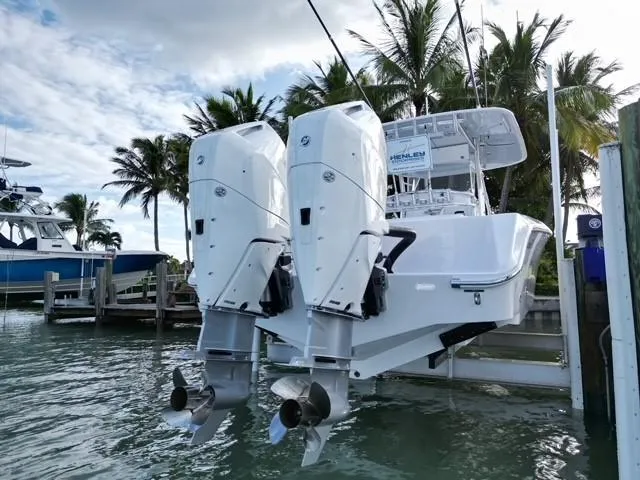Slide: The Image of 2024 Bahama 35' Open Fisherman with twin outboard engines docked. - 4
