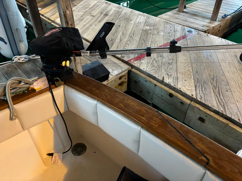 Slide: The Image of Fishing rod setup on a 1992 Bayliner 3288 Motoryacht at a wooden dock. - 10