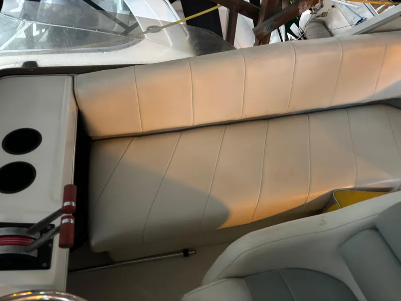 Slide: The Image of 1992 Bayliner 3288 Motoryacht interior seating with cup holders. - 11