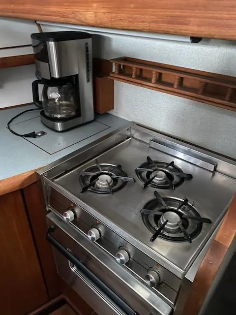 Slide: The Image of 1992 Bayliner 3288 Motoryacht kitchen with stove and coffee maker - 21