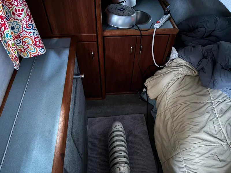 Slide: The Image of Interior cabin of a 1992 Bayliner 3288 Motoryacht with bed and kitchenette. - 22