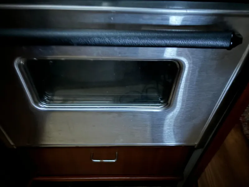Slide: The Image of Stainless steel oven in the 1992 Bayliner 3288 Motoryacht kitchen. - 26