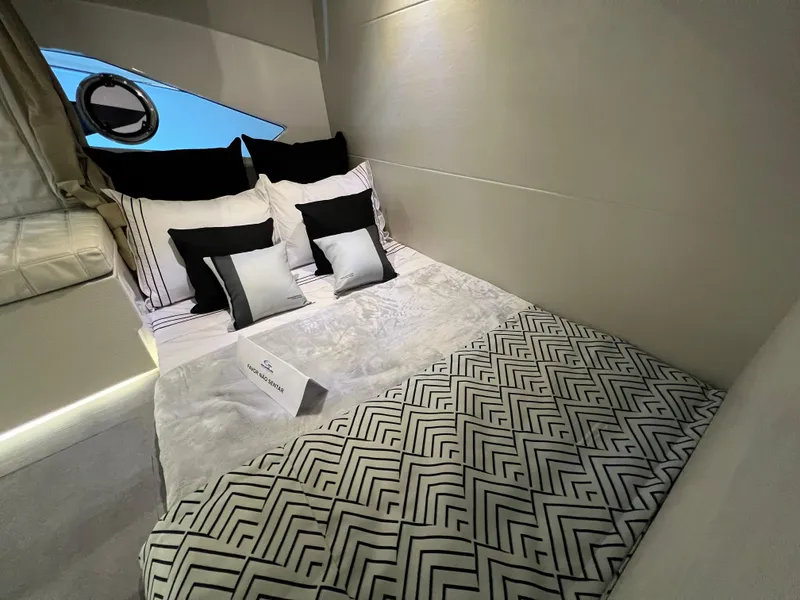 Slide: The Image of Luxurious bedroom interior of 2024 Evolve 360HT yacht with modern bedding and stylish decor. - 21