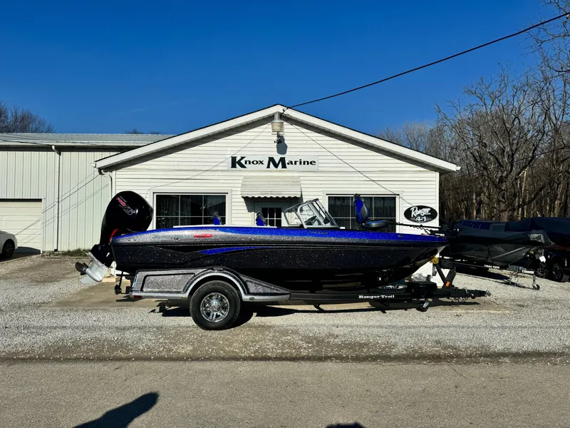 Slide: The Image of 2024 Ranger 1880MS boat on trailer outside Knox Marine dealership. - 1