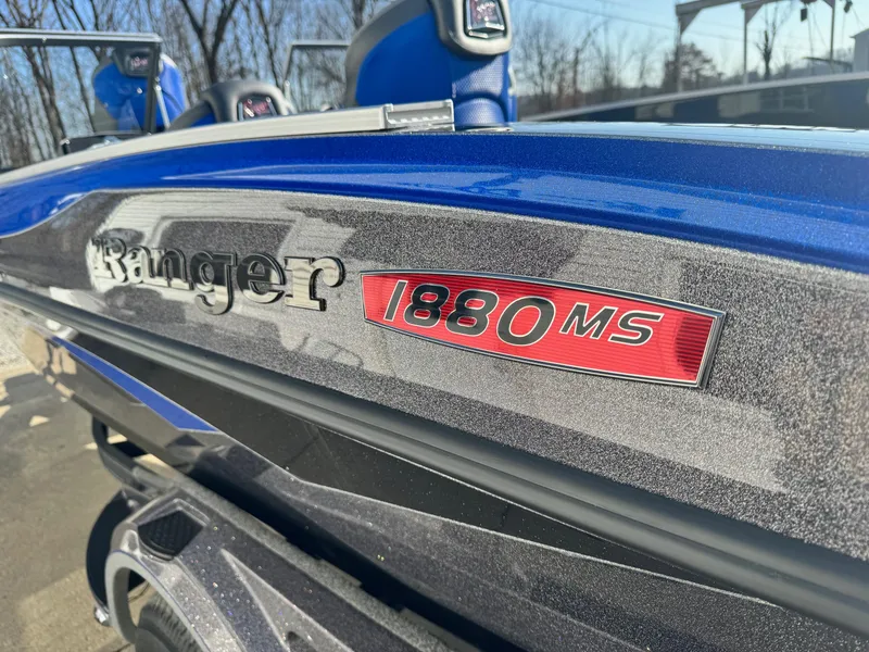 Slide: The Image of 2024 Ranger 1880MS boat close-up, blue and silver exterior with logo. - 11