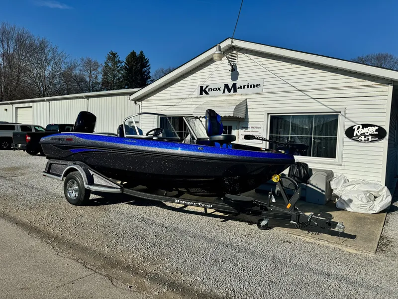 Slide: The Image of 2024 Ranger 1880MS boat on trailer outside Knox Marine building. - 2