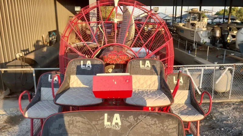 Slide: The Image of 2010 Airboat 18x8 with red frame and LA Marine seats. - 8