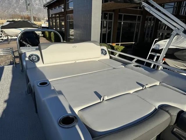 Slide: The Image of 2024 Avalon LSZ Versatile Rear Lounger 23 FT boat with spacious seating and modern design. - 10