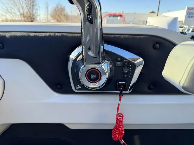 Slide: The Image of 2024 Avalon LSZ Versatile Rear Lounger 23 FT boat control panel with start-stop button. - 19