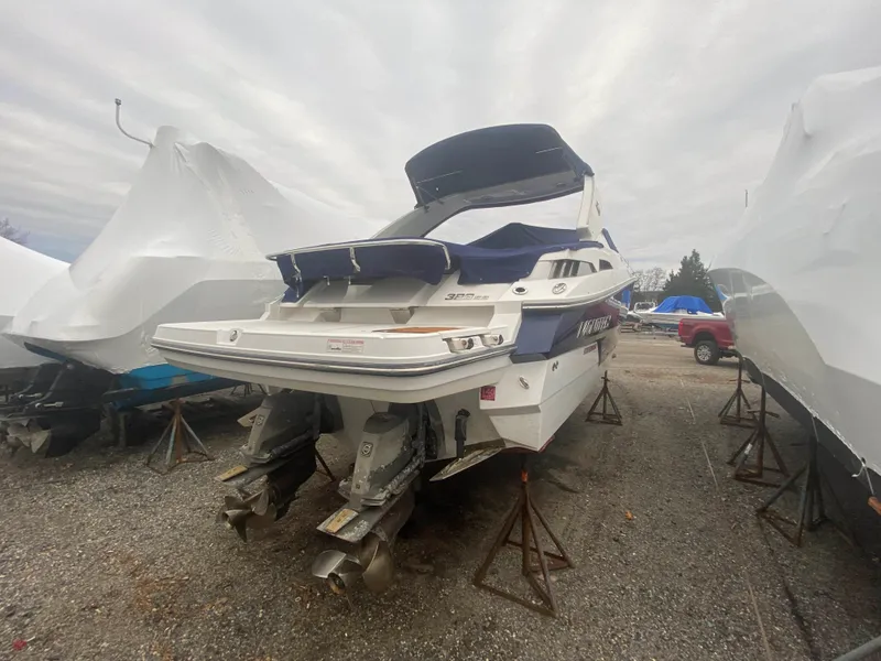 Slide: The Image of 2016 Monterey 328 Super Sport boat in storage yard. - 4