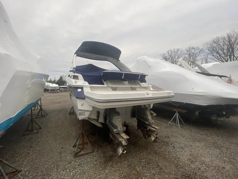 Slide: The Image of 2016 Monterey 328 Super Sport boat in storage yard. - 5