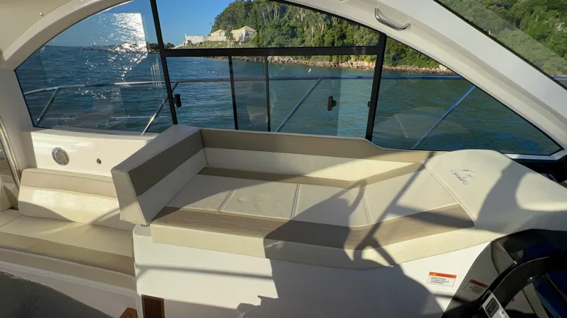 Slide: The Image of 2024 Evolve 400HT luxury yacht interior with scenic ocean view. - 15