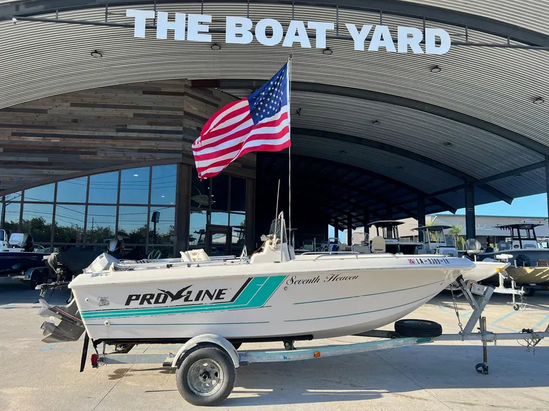 The Image of 1993 Pro-Line 170 Sportsman boat at The Boat Yard with American flag. - 0