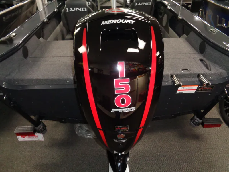 Slide: The Image of 2024 Lund 1775 Crossover XS boat with Mercury Pro XS 150 engine in showroom. - 11