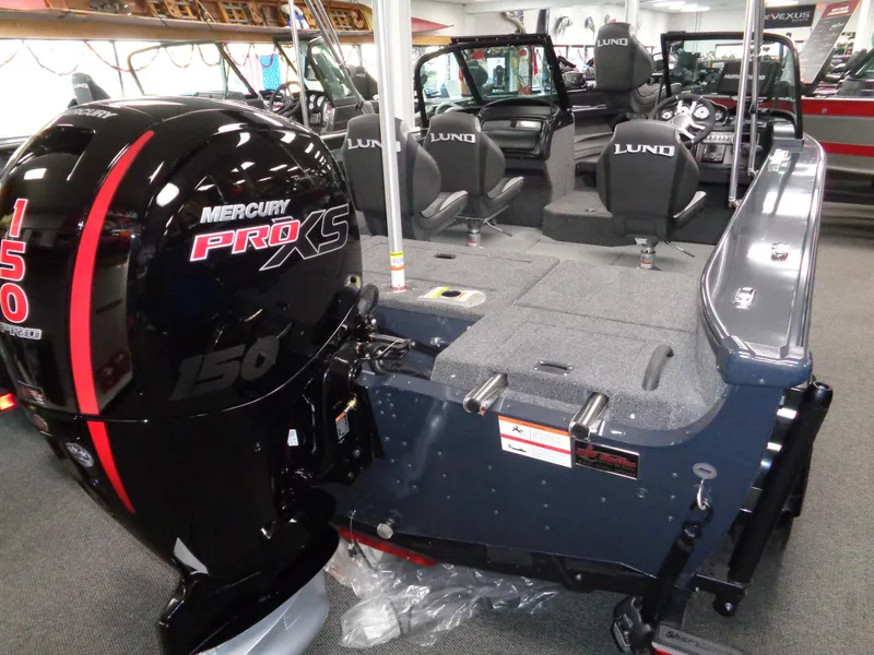 Slide: The Image of 2024 Lund 1775 Crossover XS with Mercury 150 Pro outboard motor. - 13