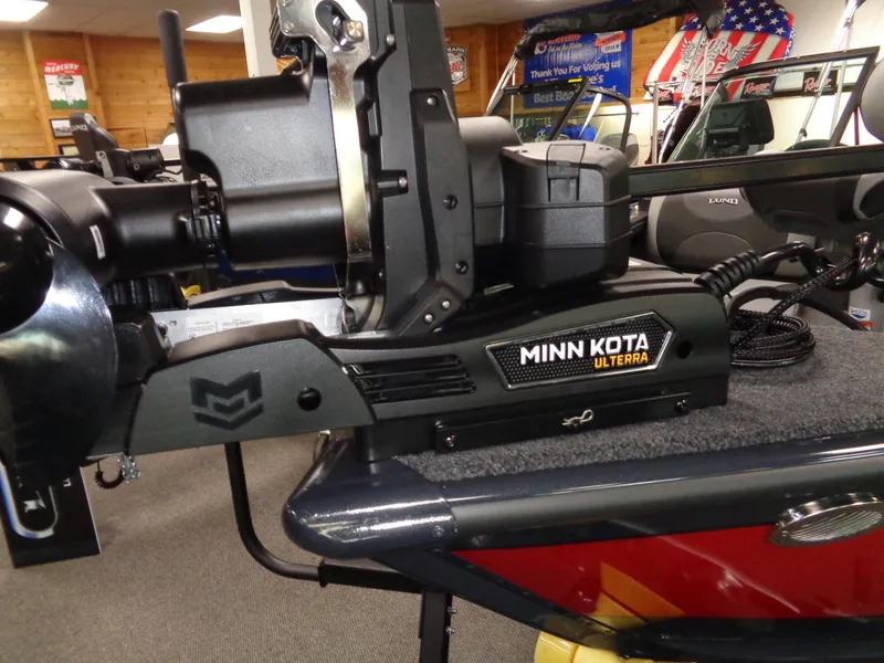 Slide: The Image of 2024 Lund 1775 Crossover XS boat interior with seating and windshield. - 18