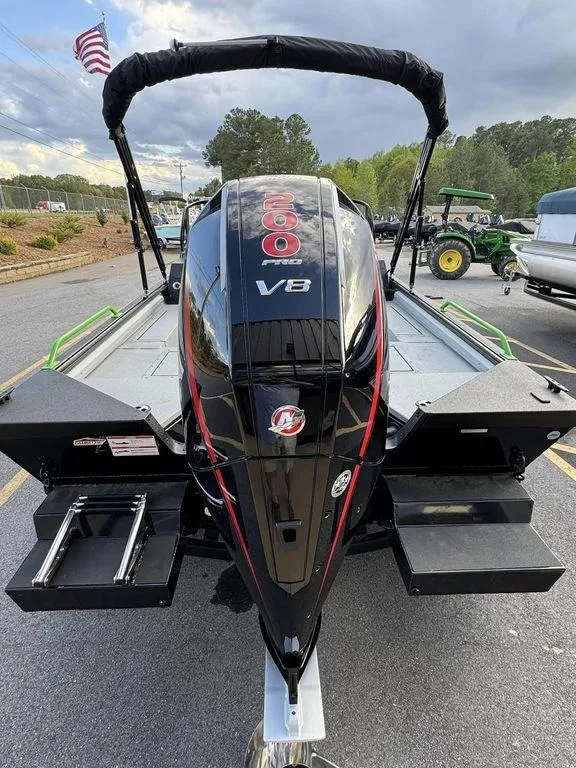 Slide: The Image of 2024 SeaArk ProCat 200 boat with powerful V8 engine, rear view. - 3